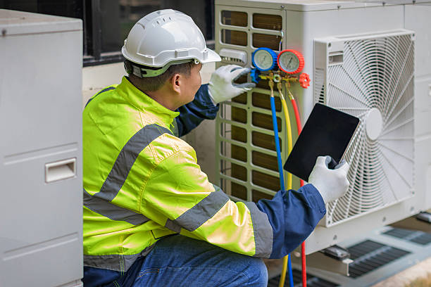 Professional Ductwork Repair technician working in Laton, CA